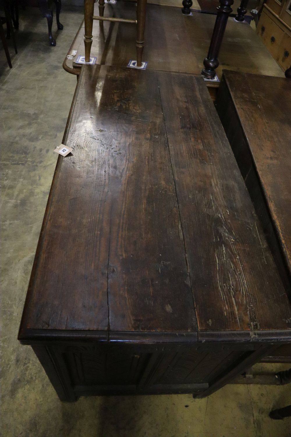 An early 18th century oak coffer, width 125cm depth 57cm height 76cm